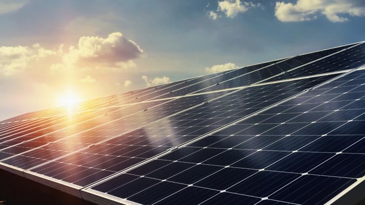A sunrise over Bexar County, symbolizing hope and sustainability with clean energy initiatives.